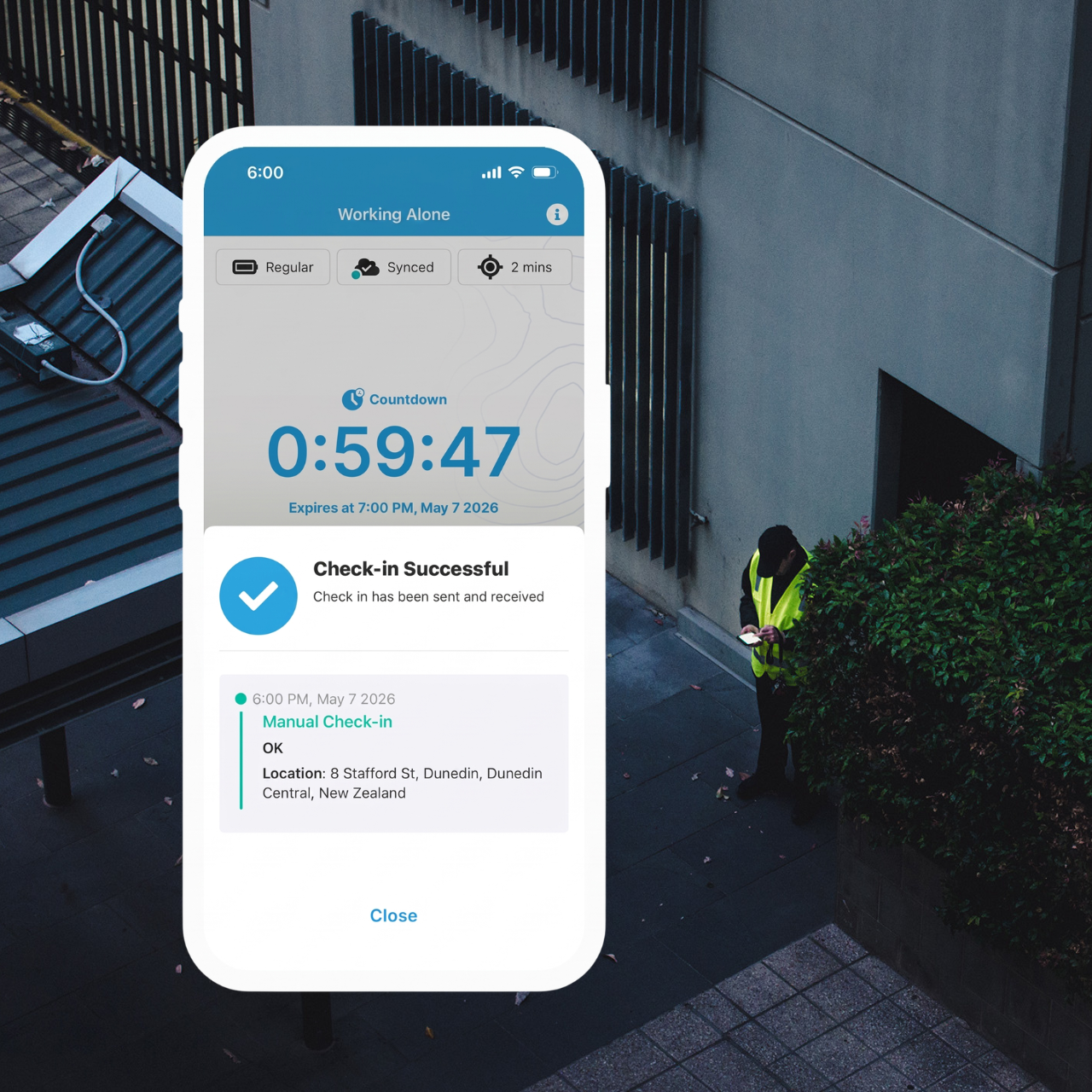 Security officer completing a safety check-in on the GetHomeSafe app.